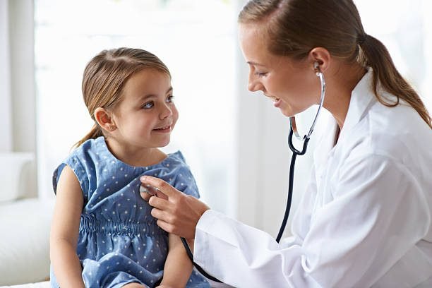 Cropped shot of an adorable young girl with her pediatricianhttp://195.154.178.81/DATA/istock_collage/0/shoots/783313.jpg